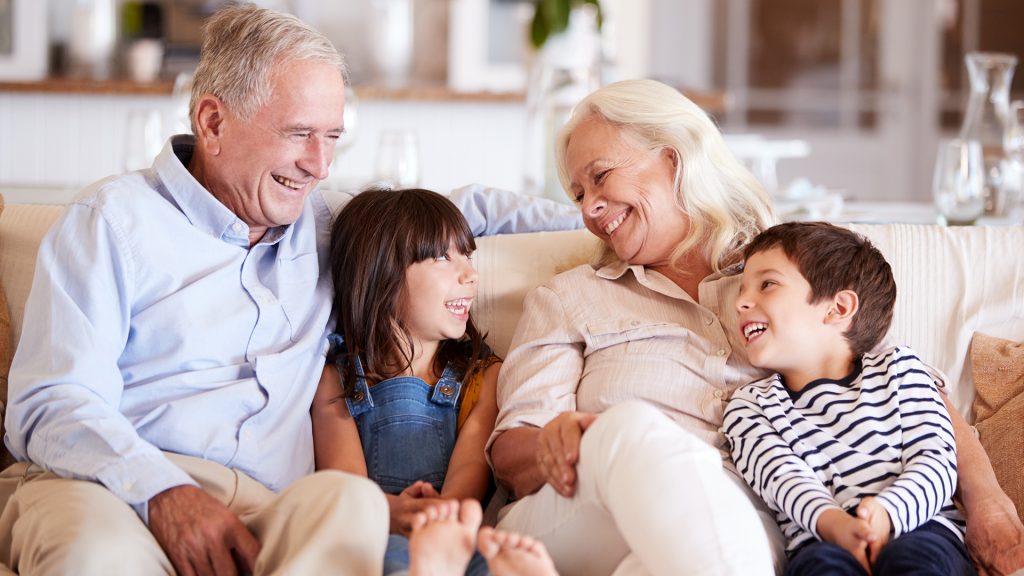 Grandparents sharing stories with their grandchildren